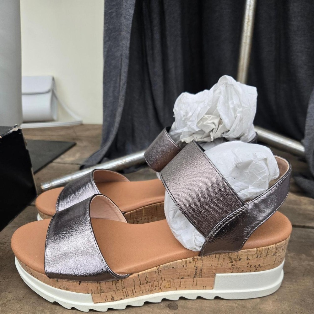 Woman's Silver metallic platform sandals with cork sole, size US 8